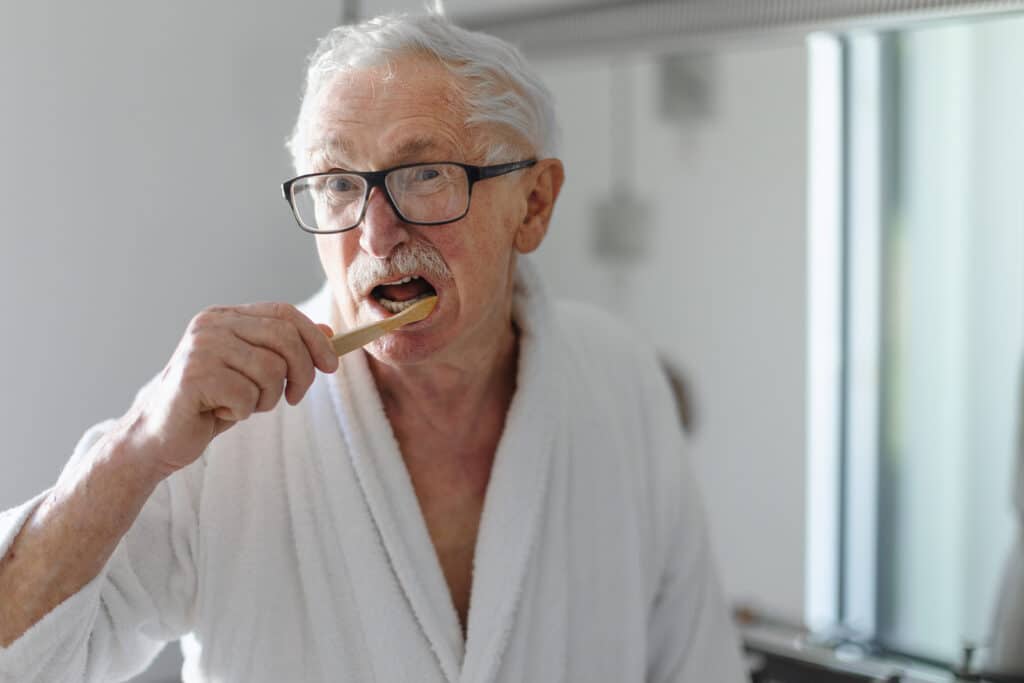 Alzheimer's home care can help with routine care like dental hygiene when these tasks become challenging for seniors with Alzheimer's